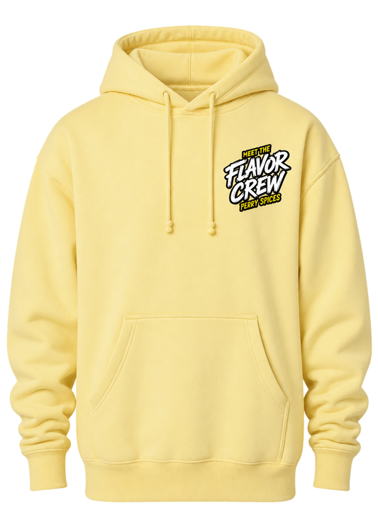 A pale yellow pullover hoodie with a drawstring hood, kangaroo pocket, and a small chest graphic reading 'MEET THE FLAVOR CREW Perry Spices' in black, white, and yellow, shown on a plain white background.